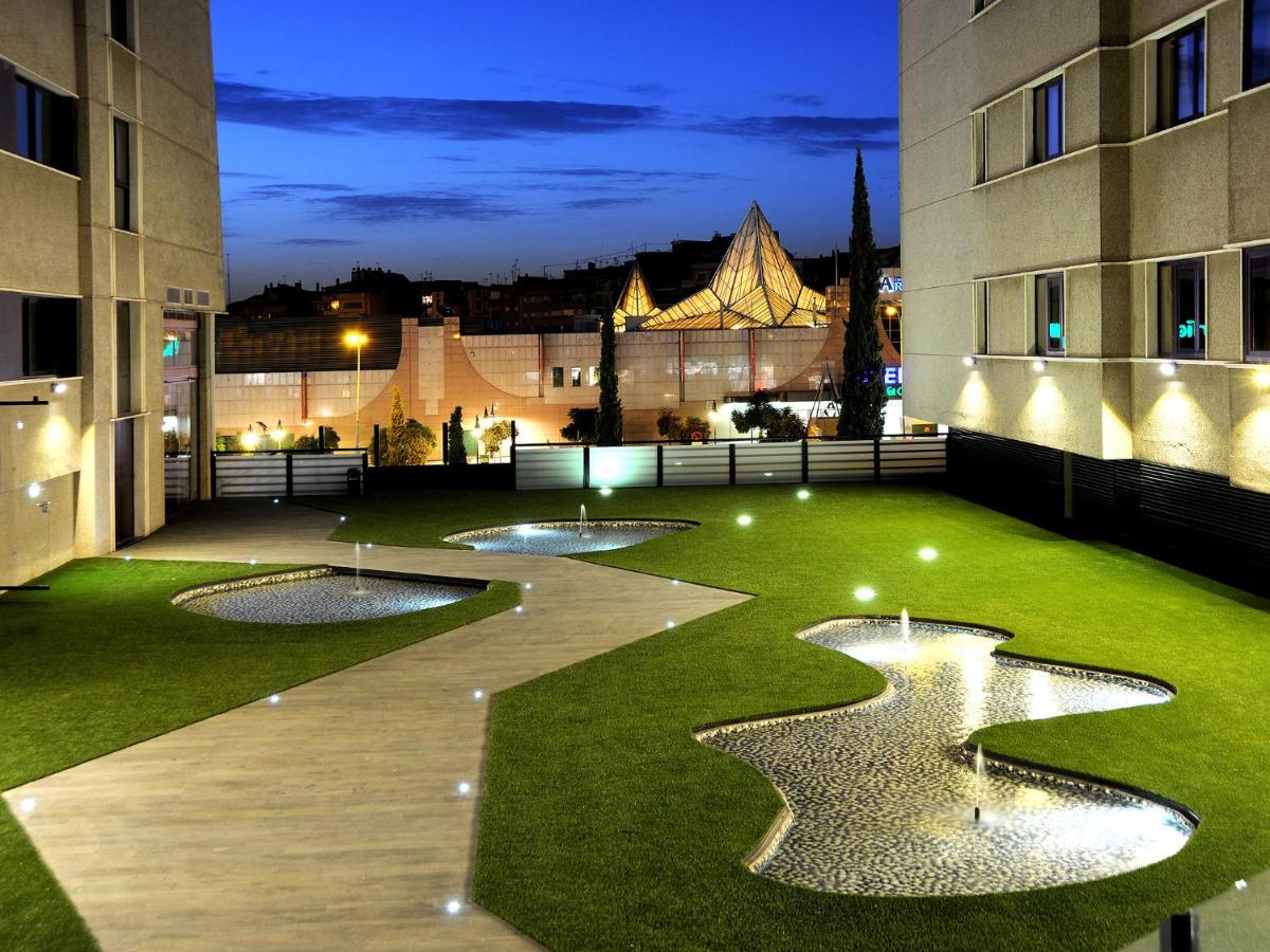 Jardín al aire libre en Gran Hotel Luna de Granada