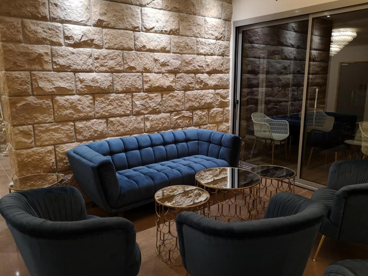 Coin salon dans l'établissement Le Diana Hôtel & Spa