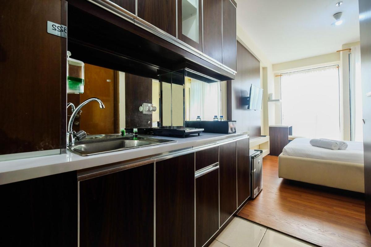 Comfy Studio Tifolia Apartment By Travelio - Housity