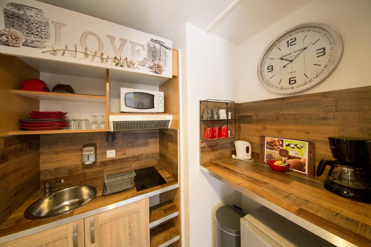 Cuisine ou kitchenette dans l'établissement Les Terrasses de Saumur - Hôtel & Appartements - Restaurant & Spa (Logis)