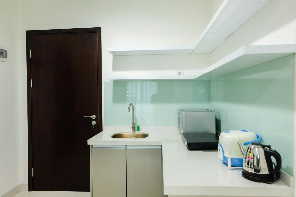 Simply and Relax 1BR at Brooklyn Alam Sutera Apartment By Travelio - Housity