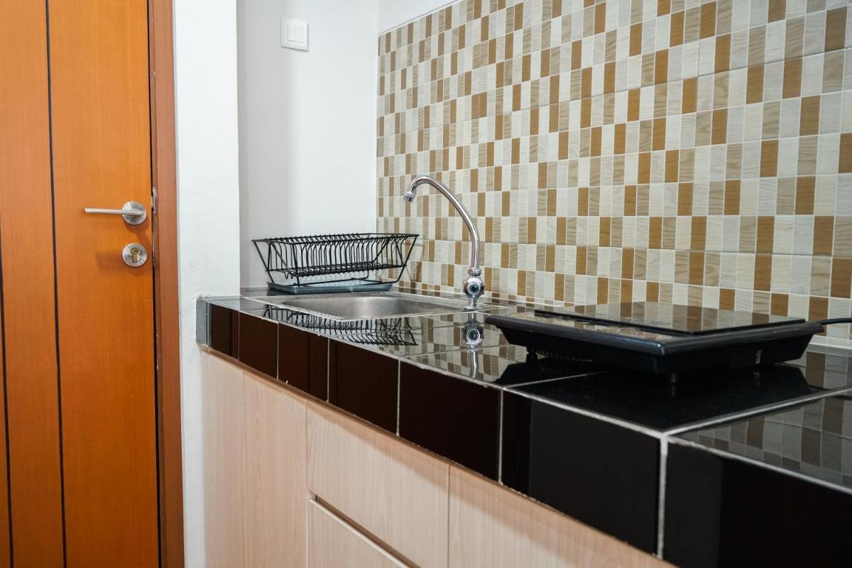 Modern Studio Apartment at Margonda Residence 5 By Travelio - Housity