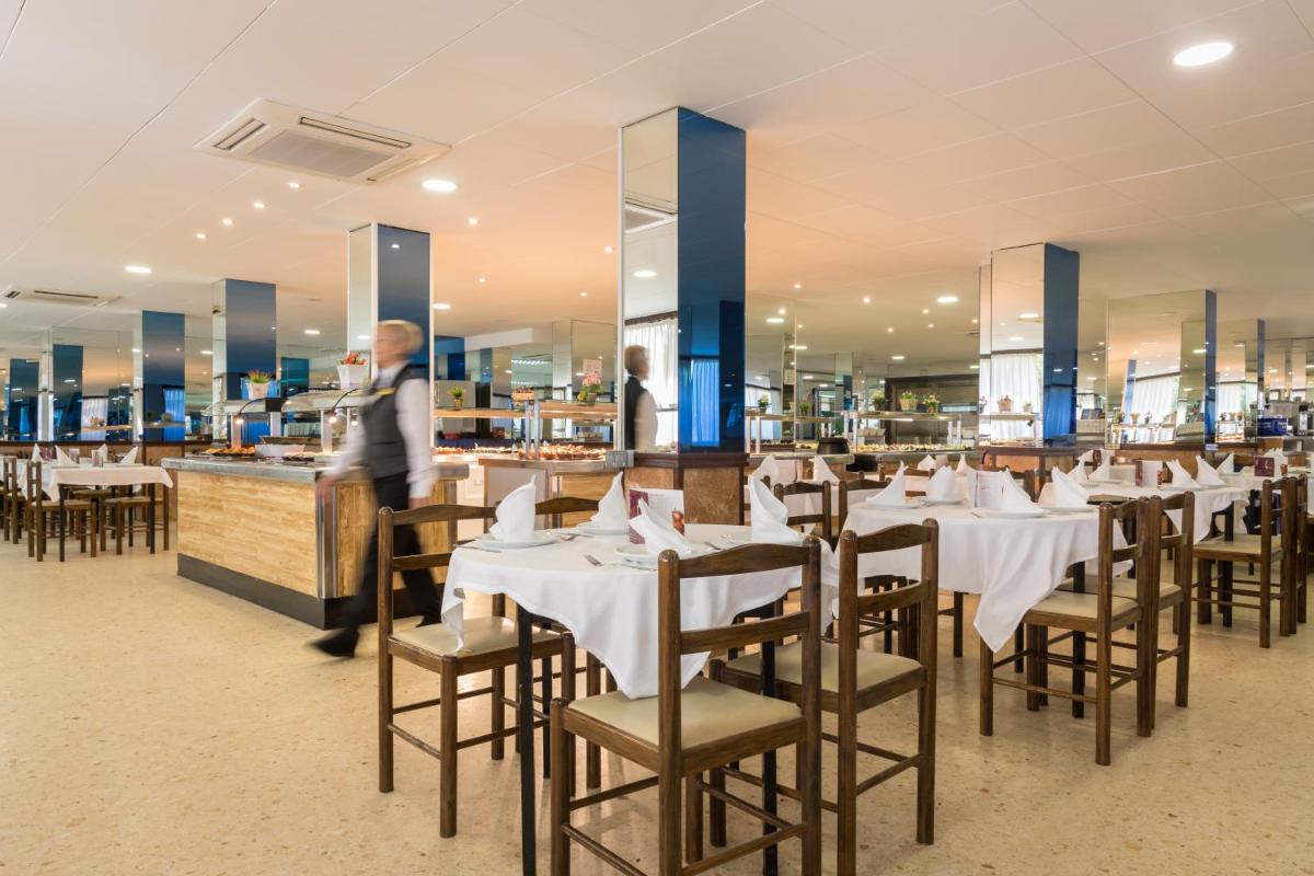 Un restaurante o sitio para comer en htop Palm Beach & SPA #htopEnjoy