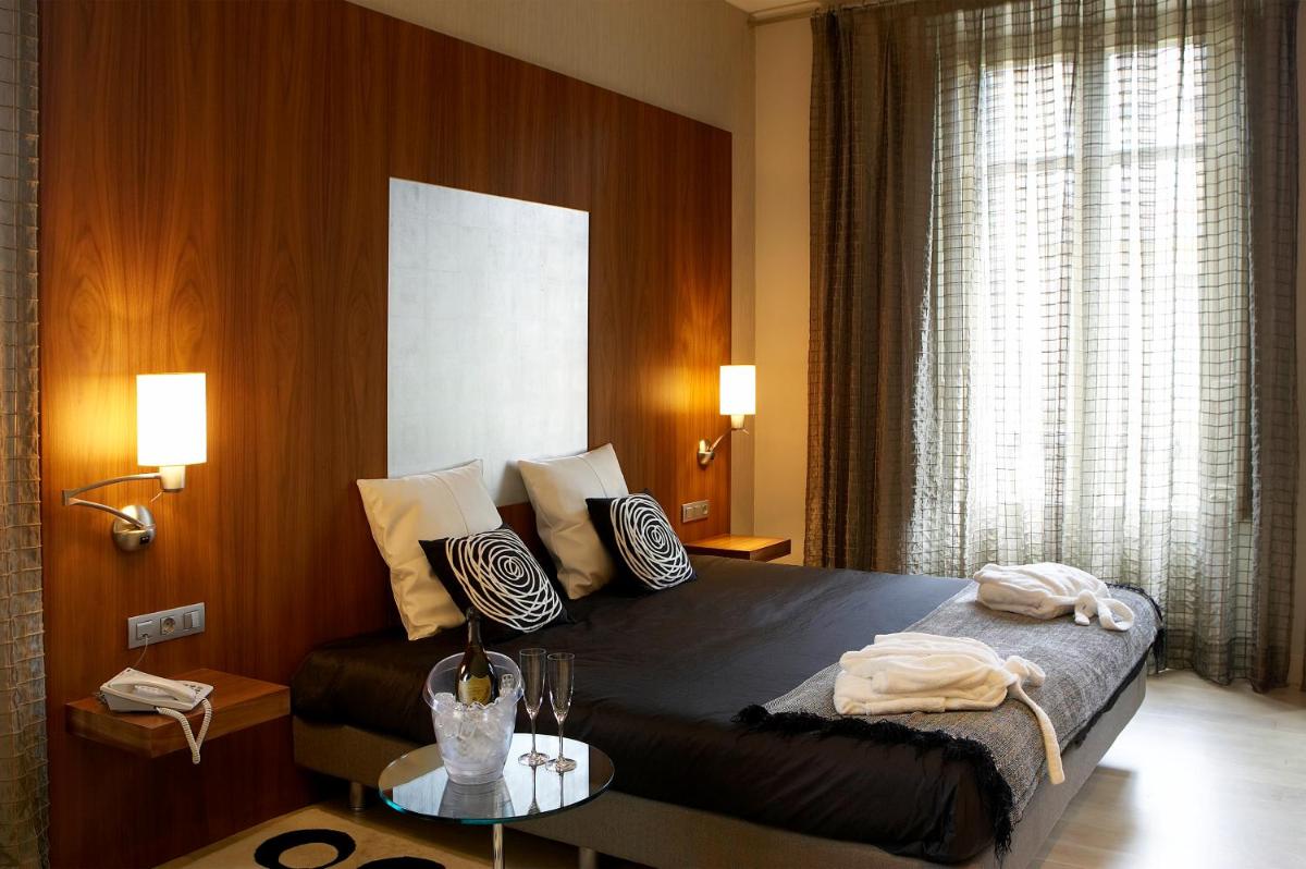 Cama o camas de una habitación en Hotel Sant Roc