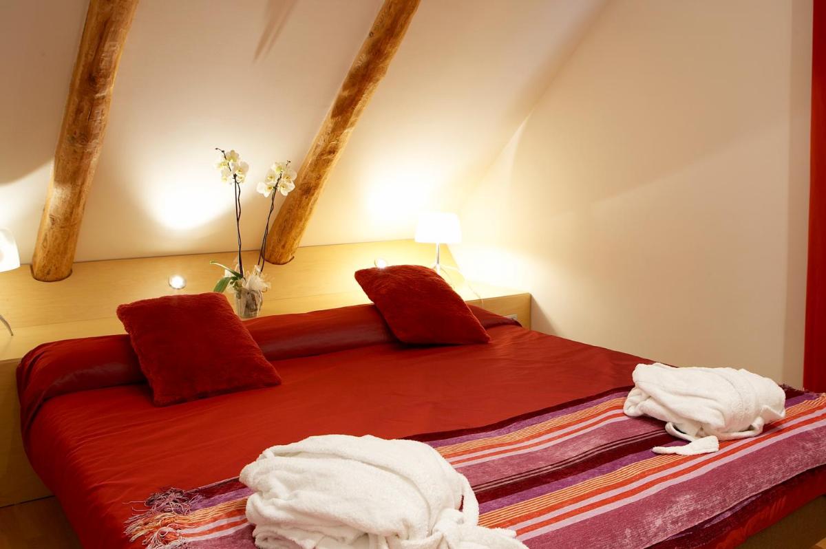 Cama o camas de una habitación en Hotel Sant Roc