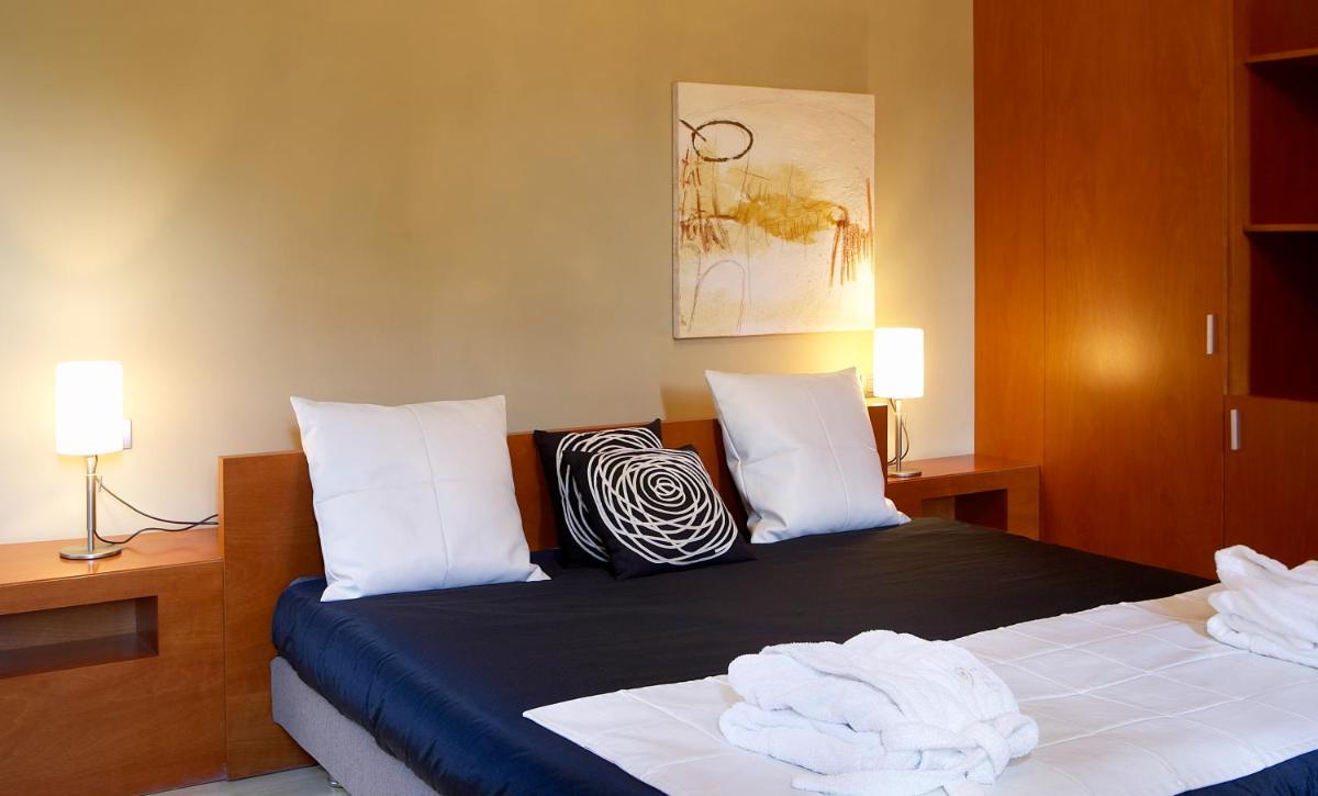 Cama o camas de una habitación en Hotel Sant Roc