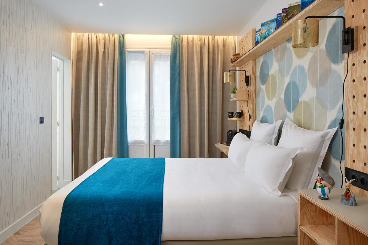 Un ou plusieurs lits dans un hébergement de l'établissement Hotel Locomo - Gare de Lyon Bastille