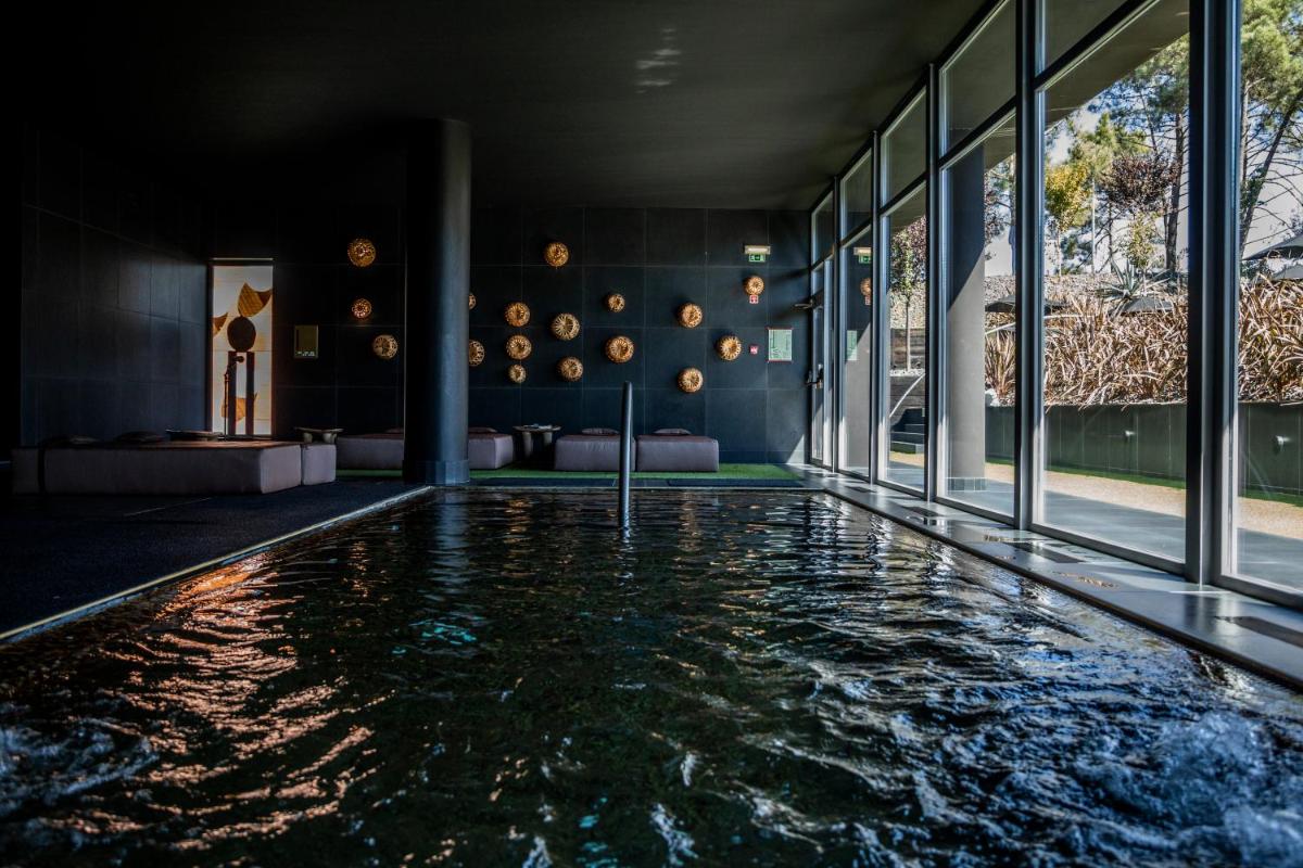 A piscina em ou perto de Evidencia Belverde Hotel