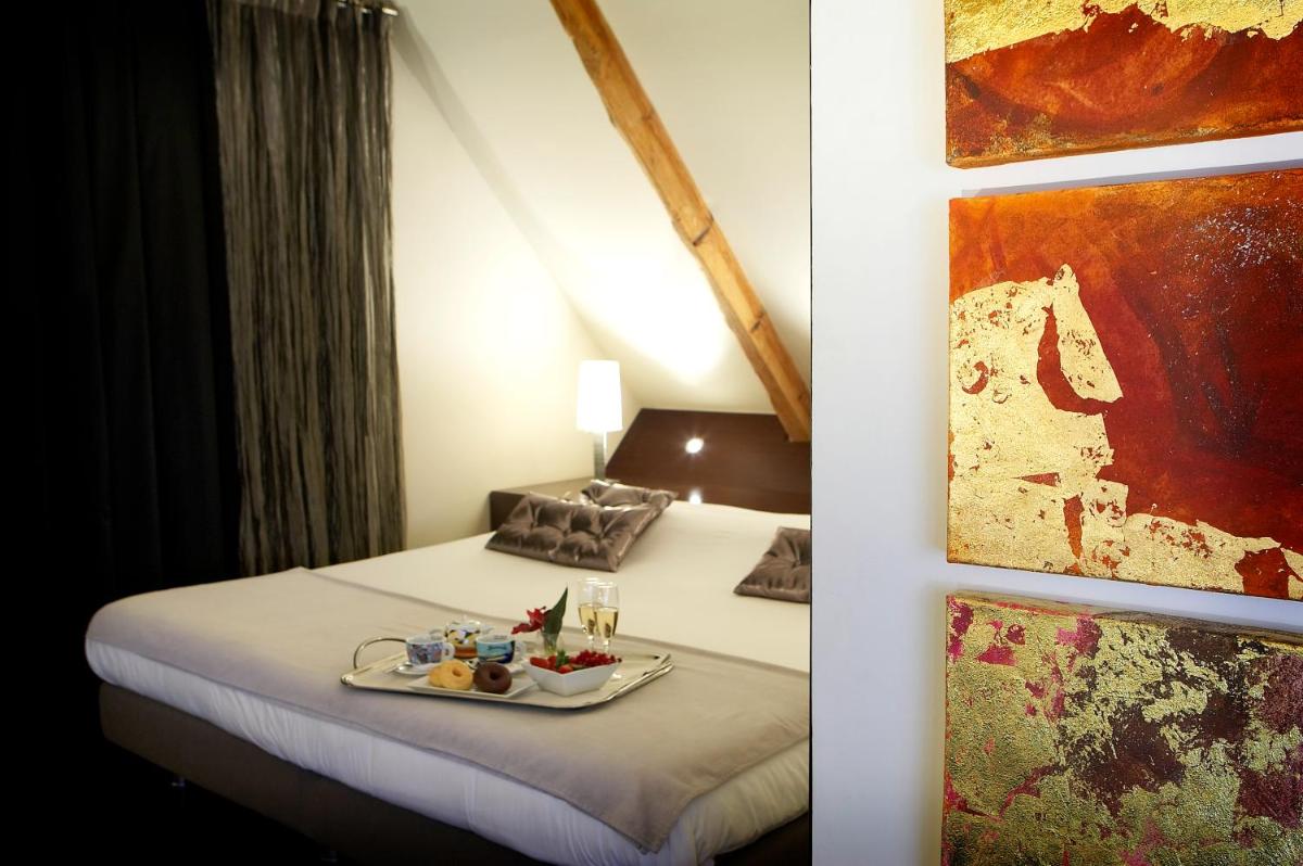 Cama o camas de una habitación en Hotel Sant Roc