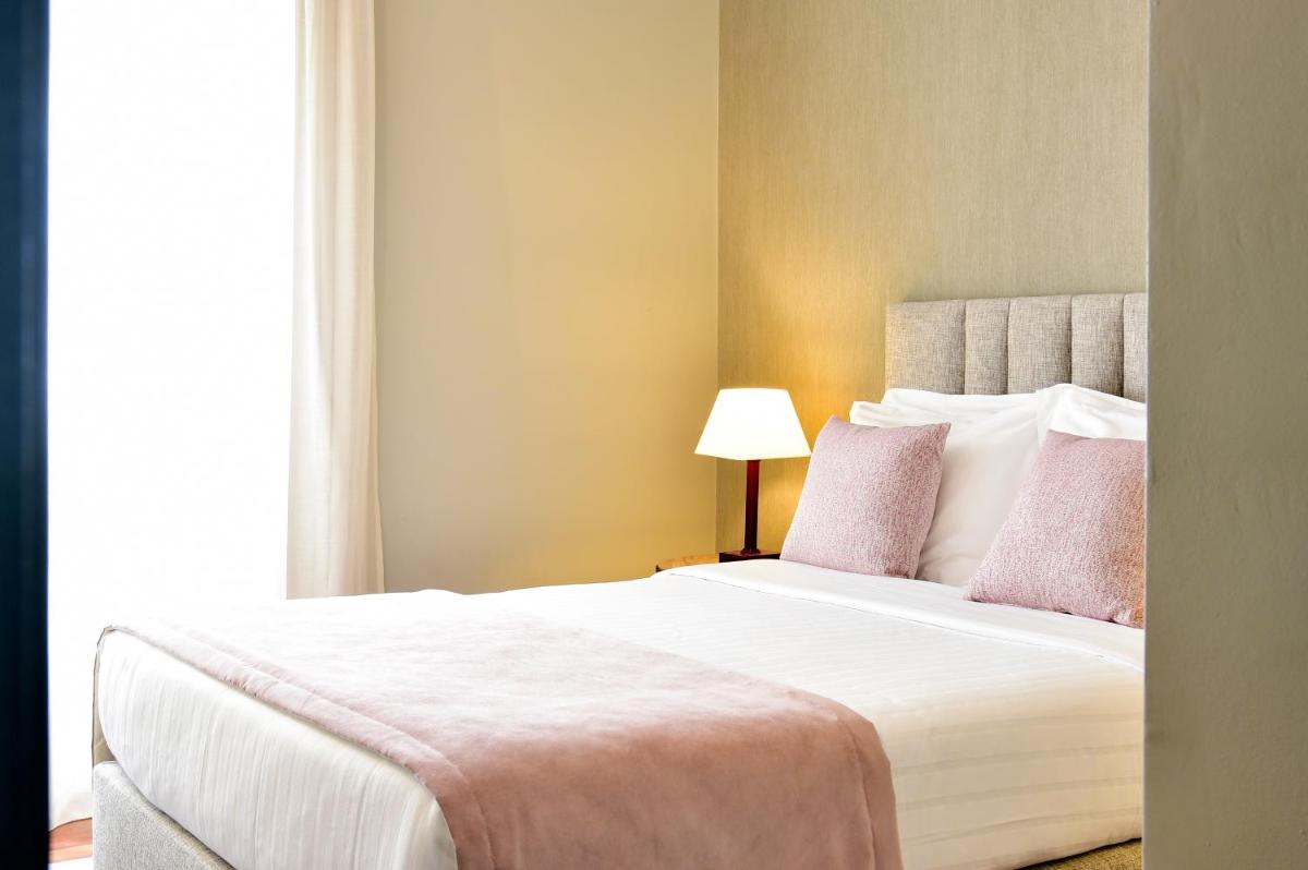 Uma cama ou camas num quarto em Central Monchique Hotel - Villa Termal Spa Resort - by Unlock Hotels