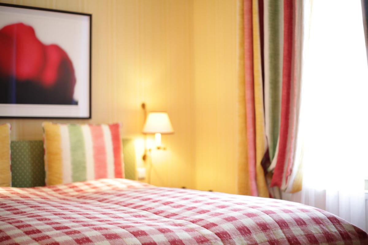 Ein Bett oder Betten in einem Zimmer der Unterkunft Hotel Stadt Hamburg