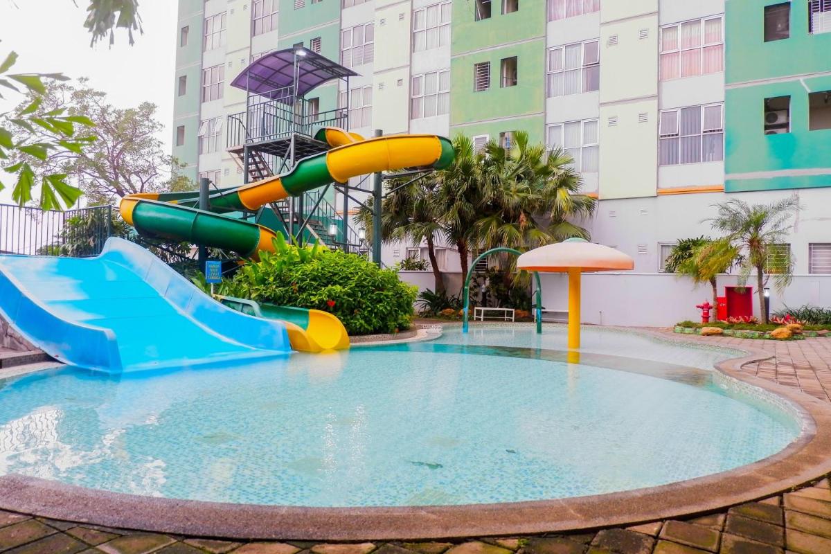 Pool View 2BR at Dian Regency Apartment By Travelio - Housity