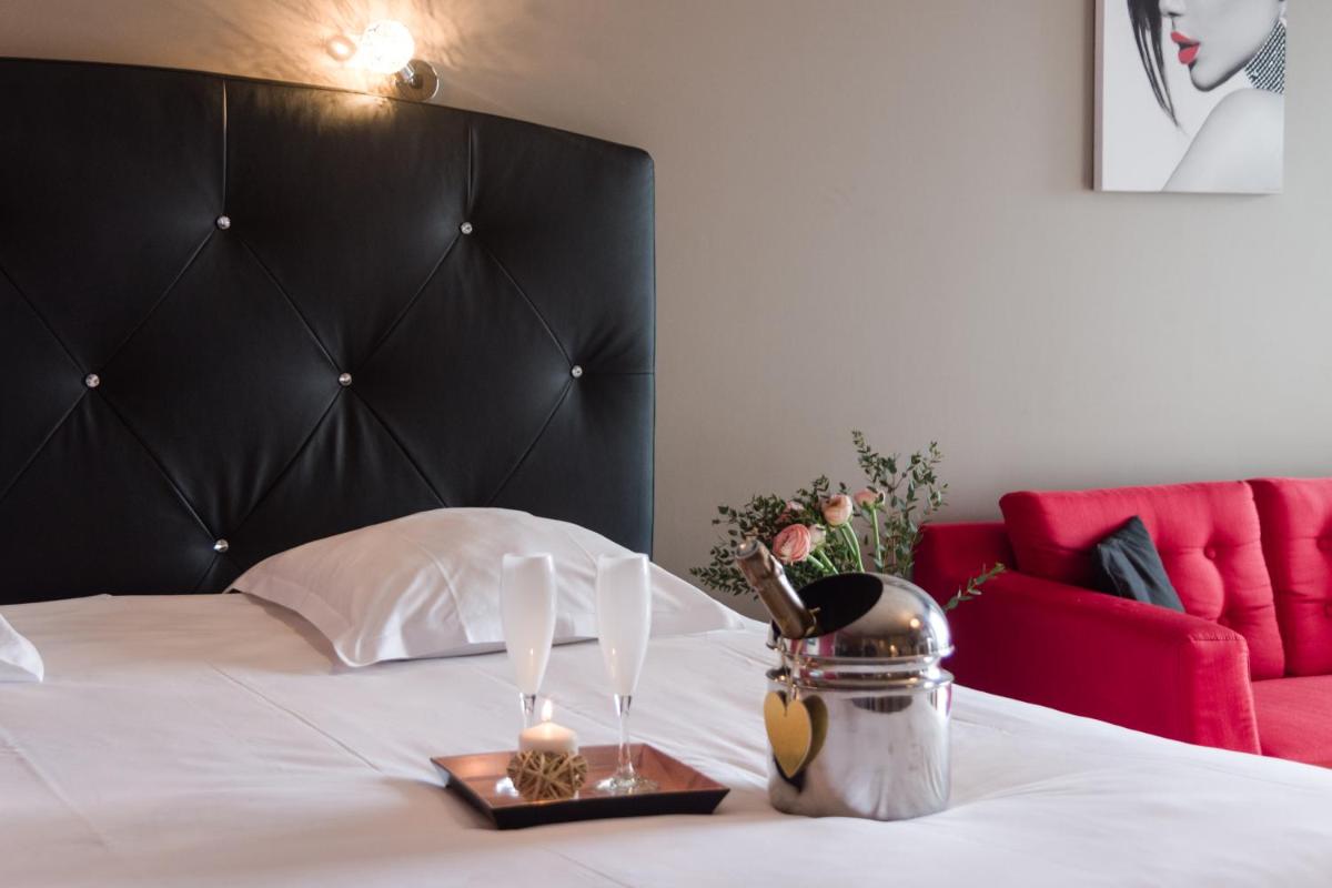 Un ou plusieurs lits dans un hébergement de l'établissement Résidence Hôtelière Natureva & Spa