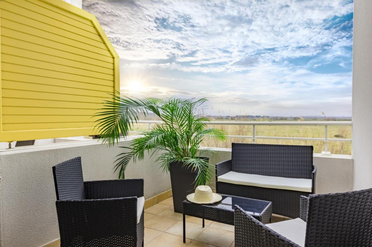 Balcon ou terrasse dans l'établissement Résidence Hôtelière Natureva & Spa