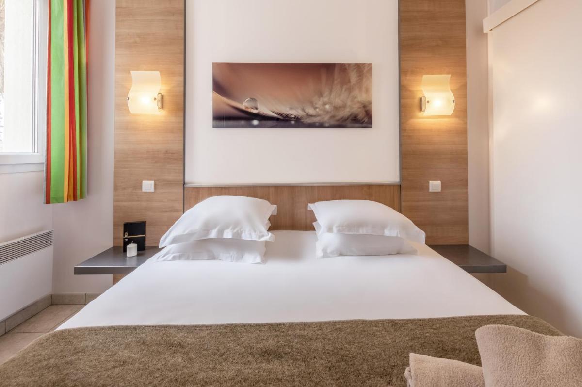 Un ou plusieurs lits dans un hébergement de l'établissement Résidence Hôtelière Natureva & Spa