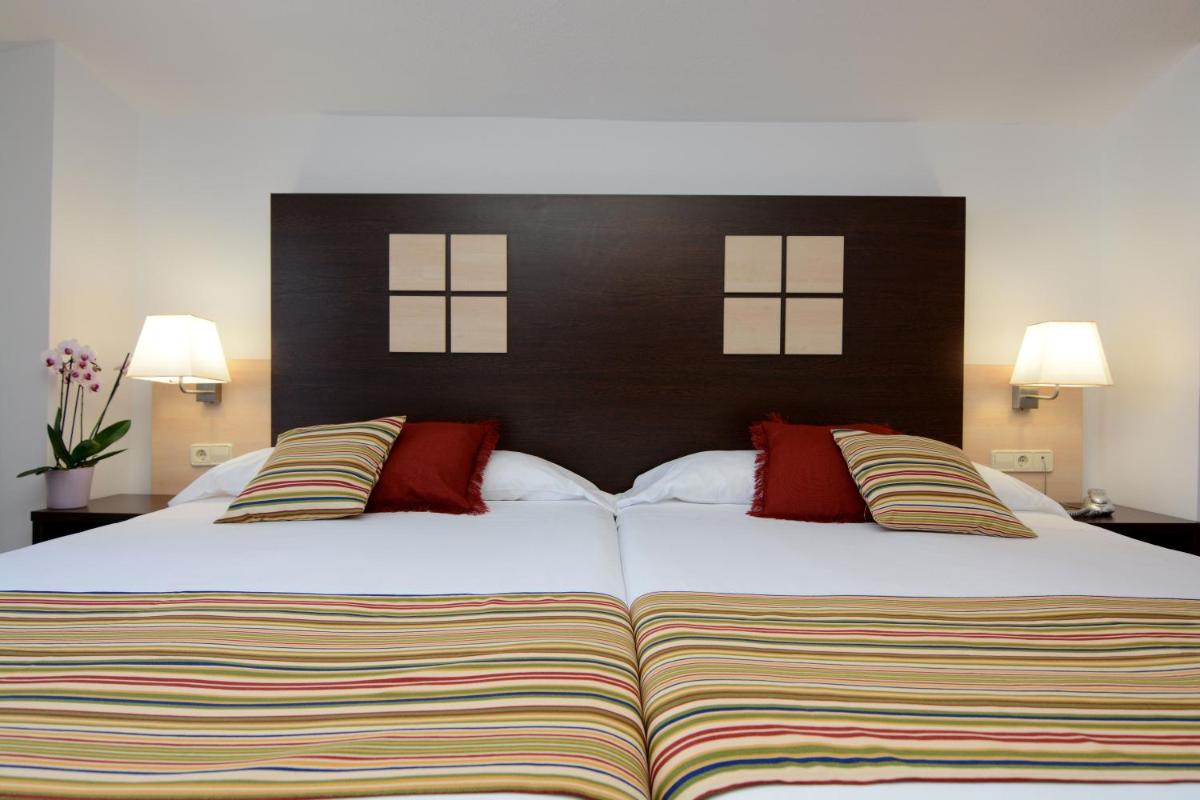 Cama o camas de una habitación en Don Angel & SPA & Padel- Adults Recommended