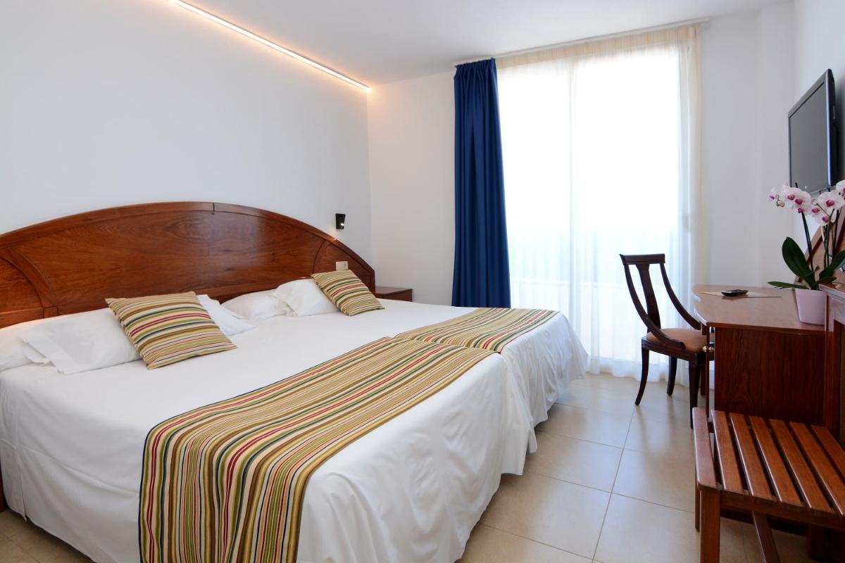 Cama o camas de una habitación en Don Angel & SPA & Padel- Adults Recommended
