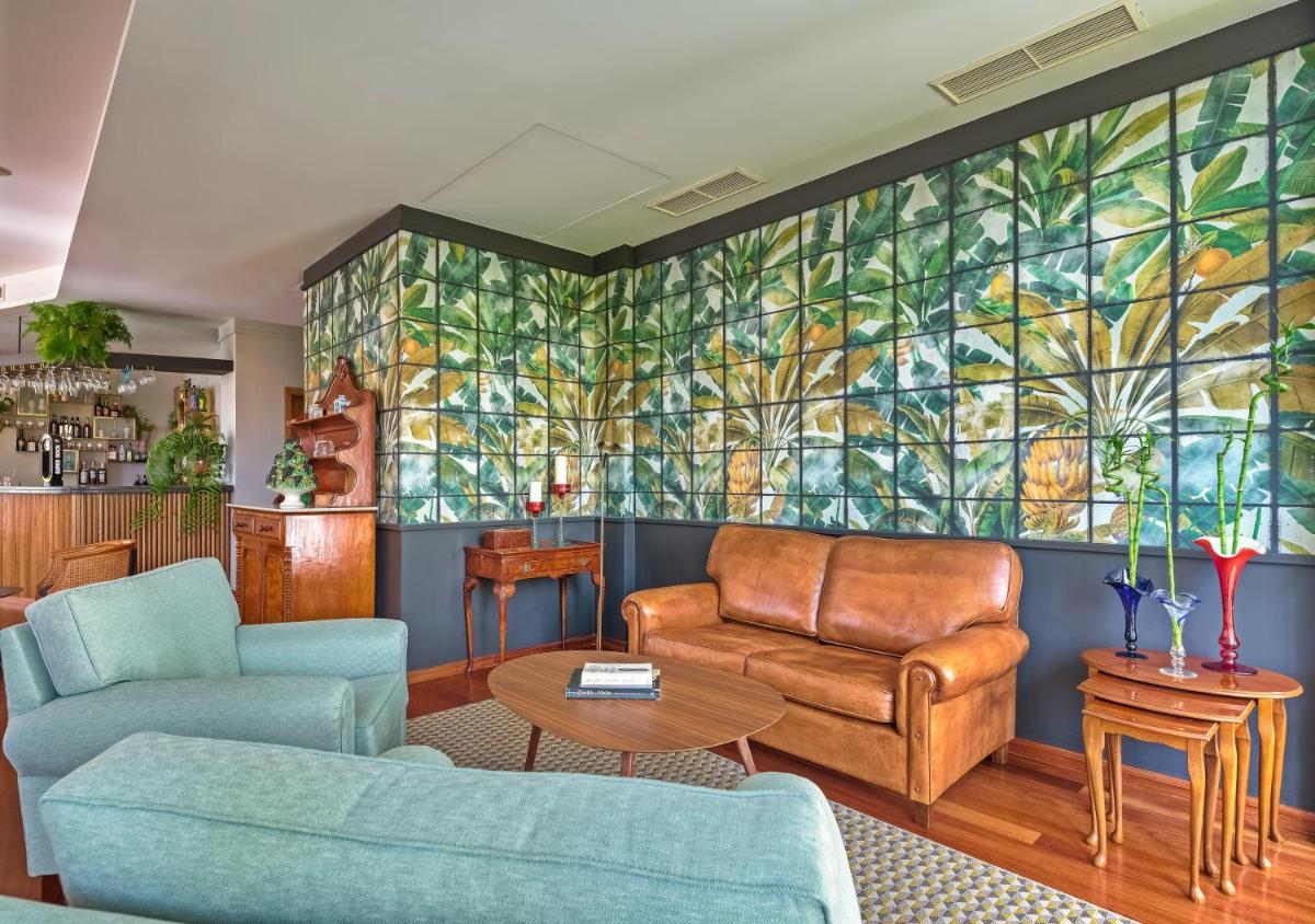 Uma área de estar em Quintinha Sao Joao Hotel & Spa