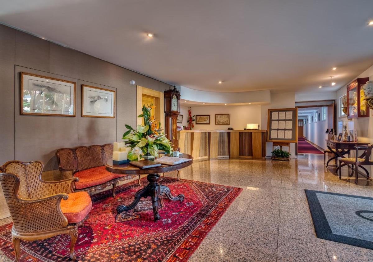 Uma área de estar em Quintinha Sao Joao Hotel & Spa