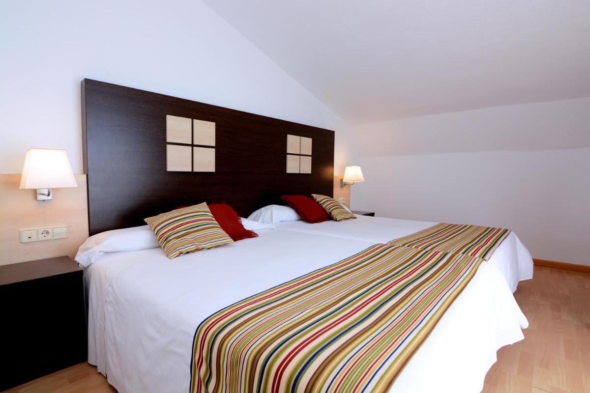 Cama o camas de una habitación en Don Angel & SPA & Padel- Adults Recommended