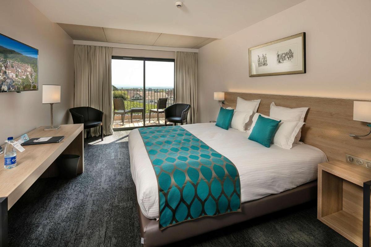 Un ou plusieurs lits dans un hébergement de l'établissement Best Western Plus Hotel & SPA Le Schoenenbourg