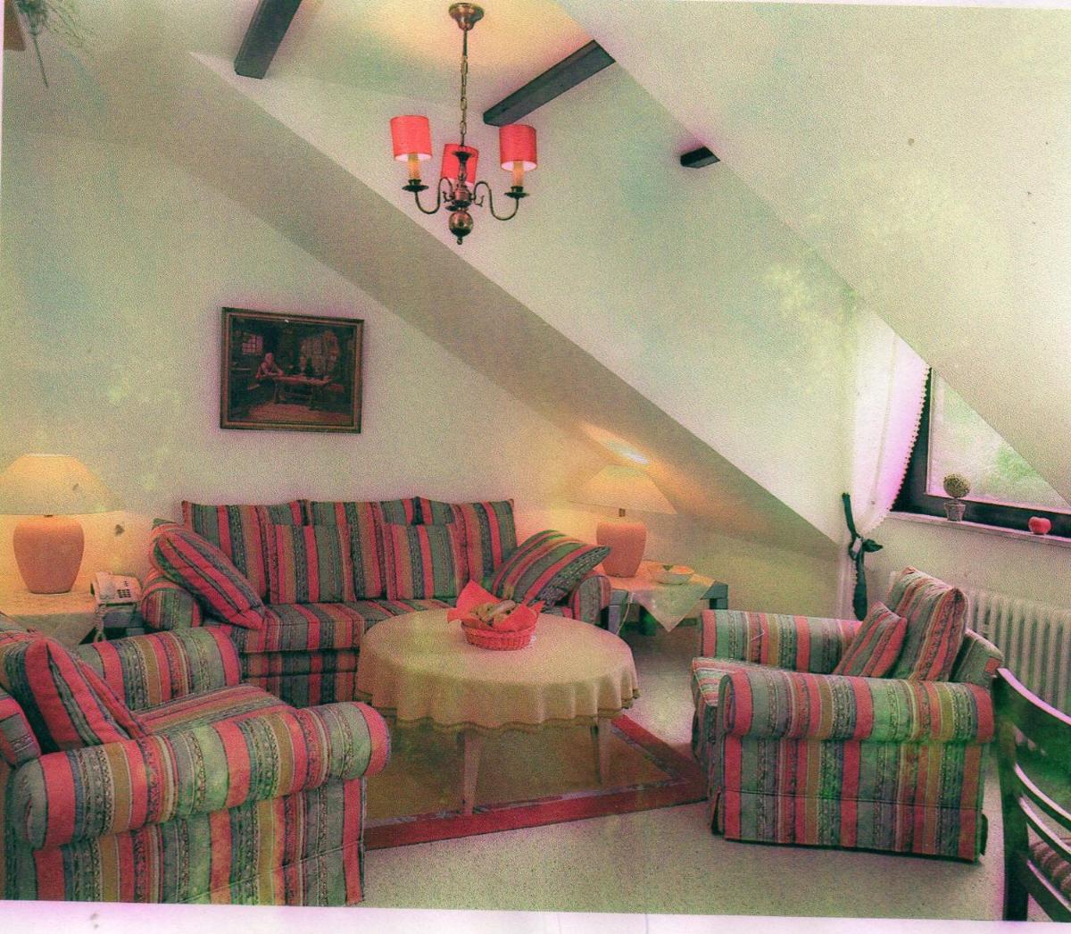 Ein Sitzbereich in der Unterkunft Wellness und Romantik Hotel Helmboldt