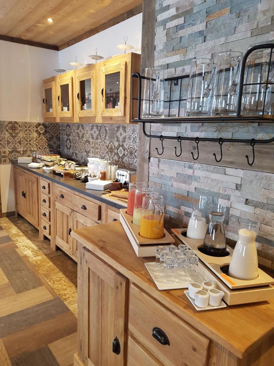 Cuisine ou kitchenette dans l'établissement Chalet Marano Restaurant & Spa