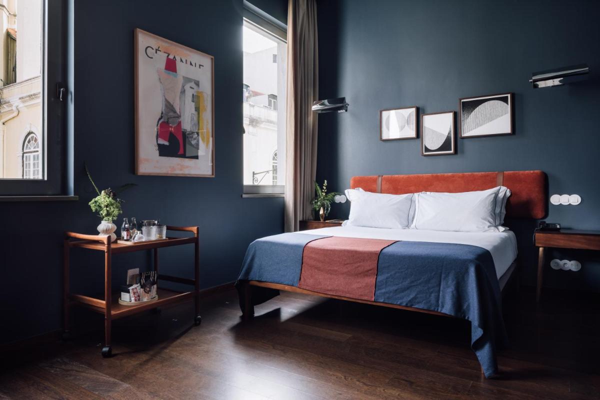Uma cama ou camas num quarto em The Vintage Hotel & Spa Lisbon