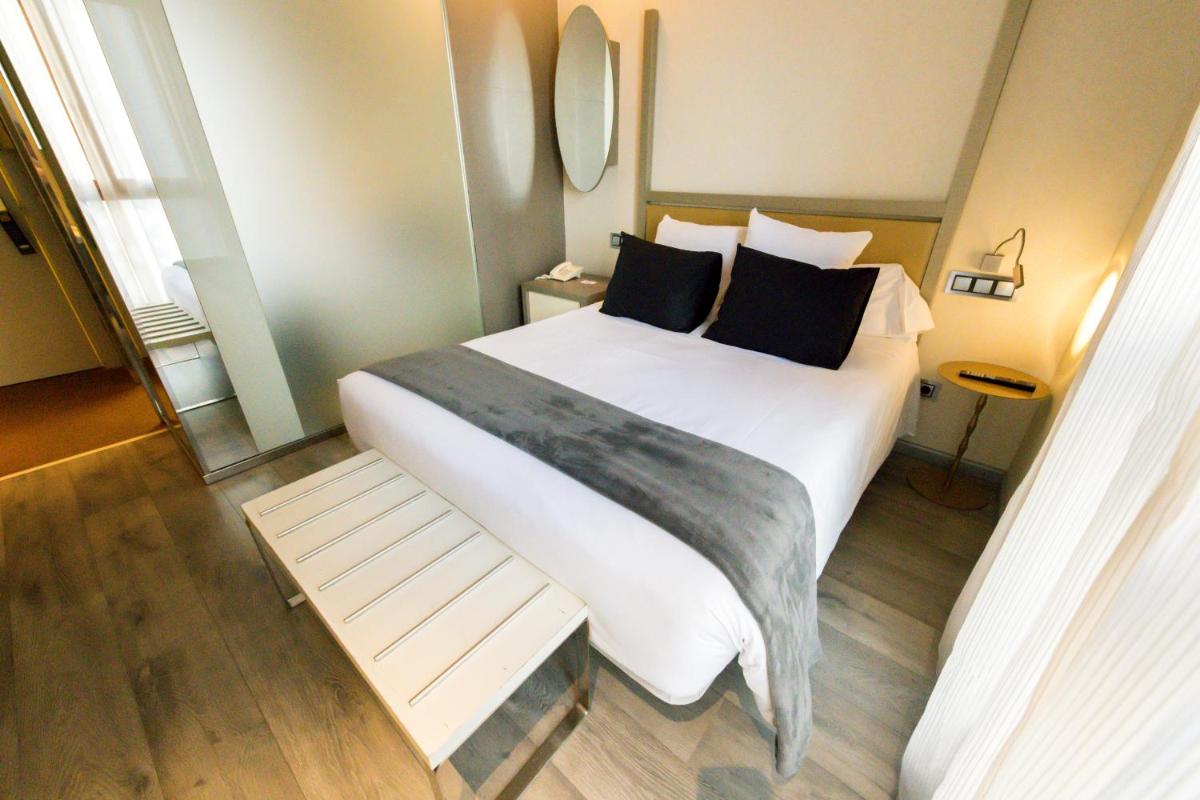 Cama o camas de una habitación en Hotel & Spa Princesa Munia