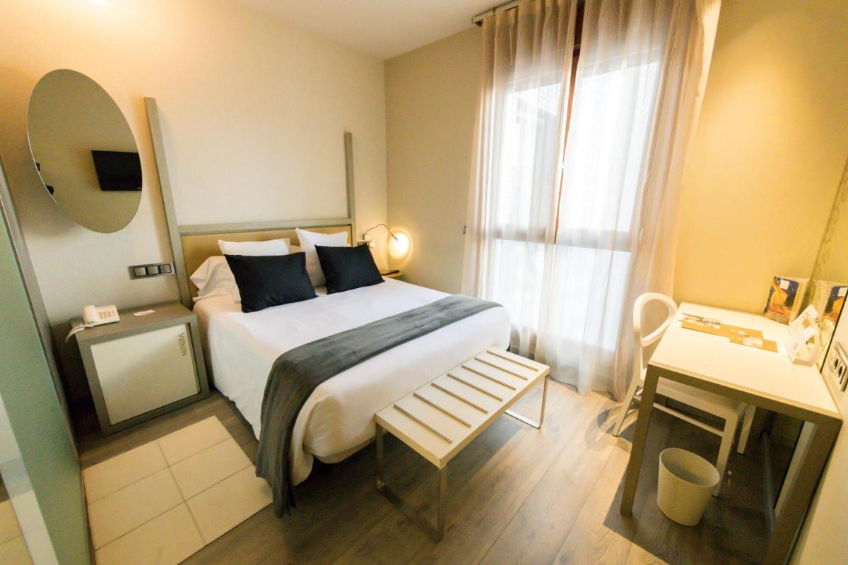 Cama o camas de una habitación en Hotel & Spa Princesa Munia