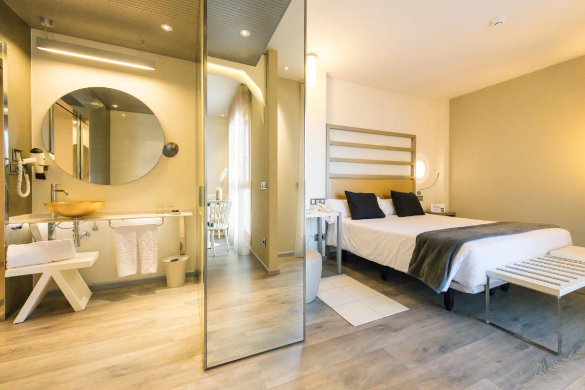 Cama o camas de una habitación en Hotel & Spa Princesa Munia