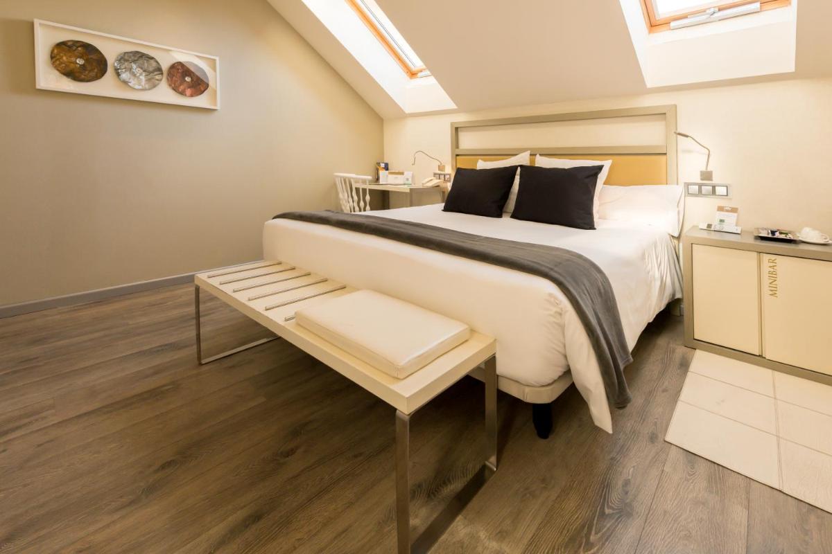 Cama o camas de una habitación en Hotel & Spa Princesa Munia