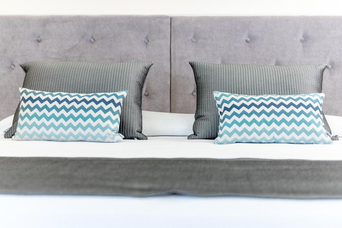 Cama o camas de una habitación en Grand Hotel Palladium Santa Eulalia del Río