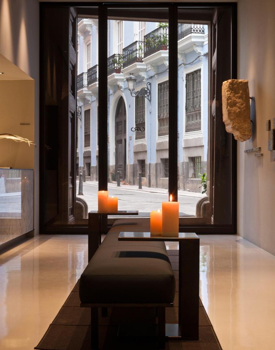 Zona de estar de Caro Hotel