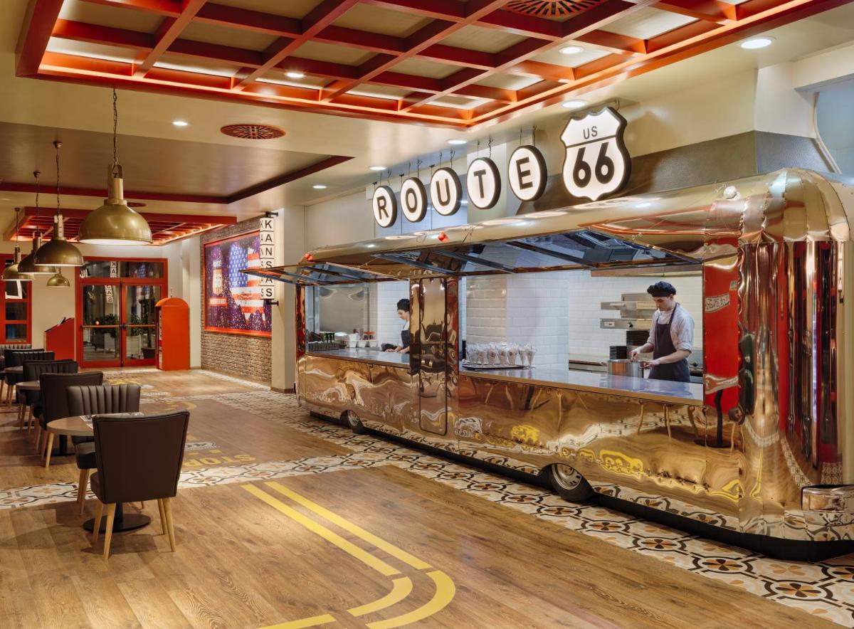 Un restaurante o sitio para comer en H10 Tindaya
