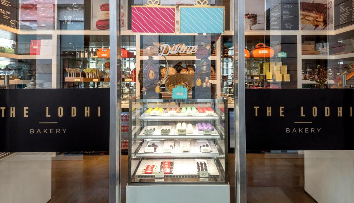 a display window of a bakery with books on display at The Lodhi – A member of The Leading Hotels Of The World in New Delhi