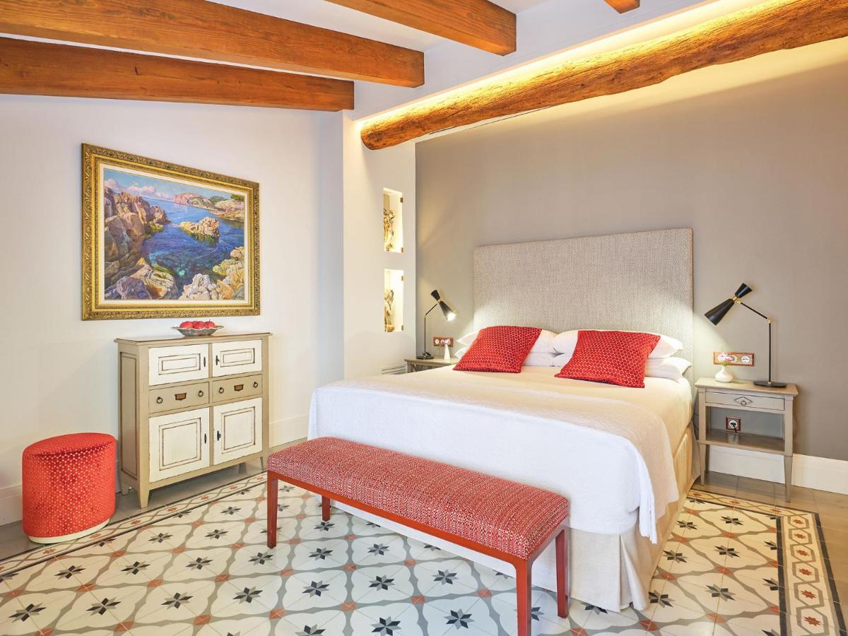 Cama o camas de una habitación en Hotel Gloria de Sant Jaume