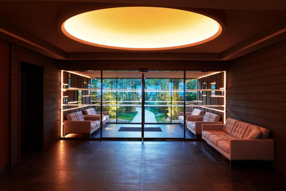 Coin salon dans l'établissement Hôtel Plage Palace & Spa