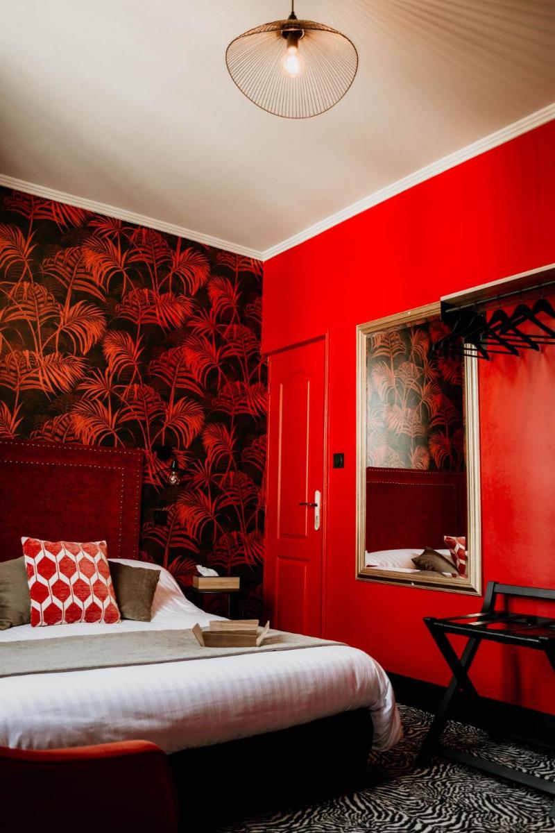 Un ou plusieurs lits dans un hébergement de l'établissement La villa 10 HÔTEL SPA