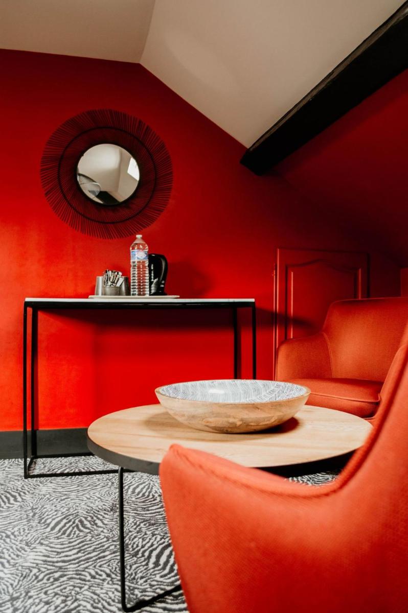 Coin salon dans l'établissement La villa 10 HÔTEL SPA