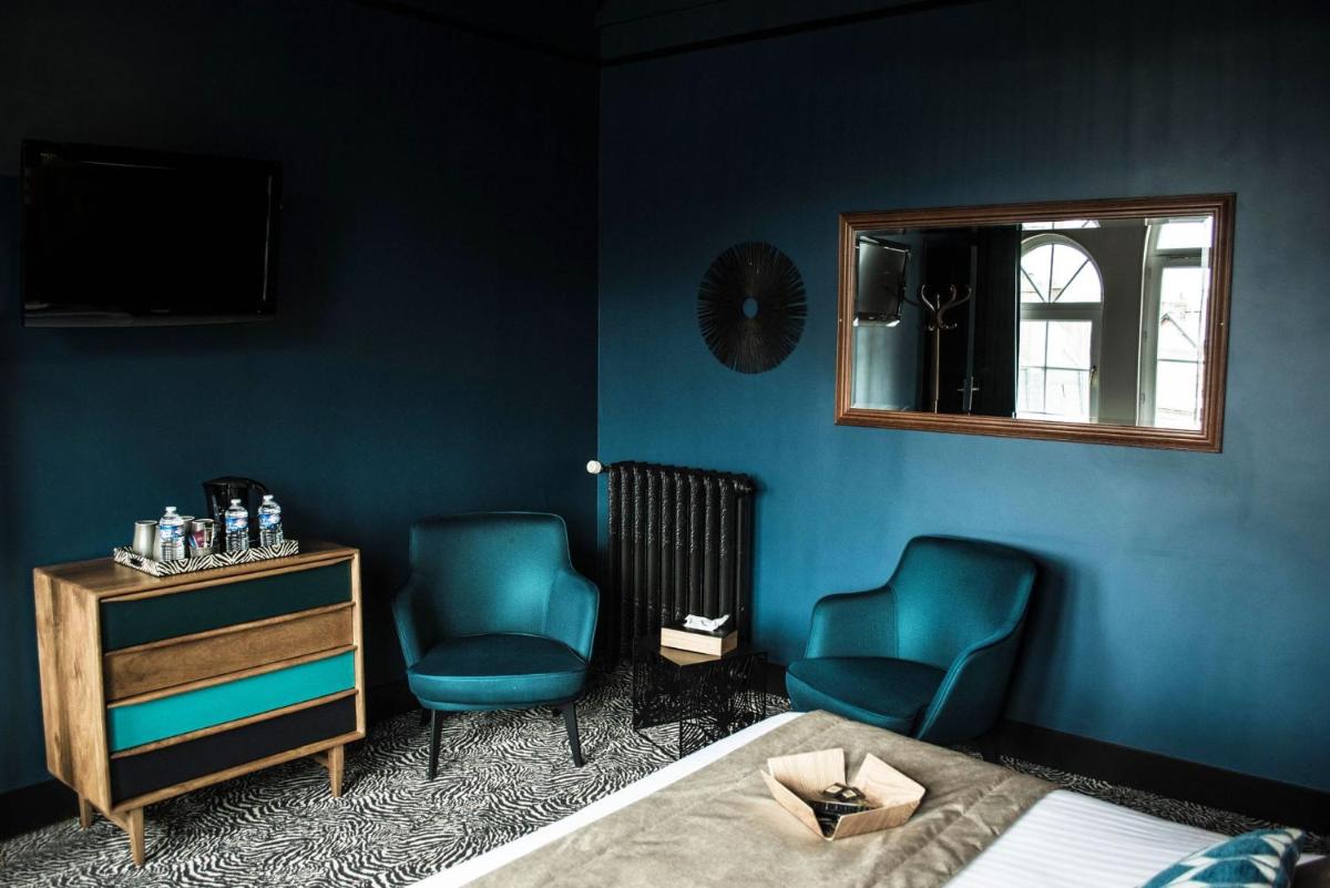 Coin salon dans l'établissement La villa 10 HÔTEL SPA