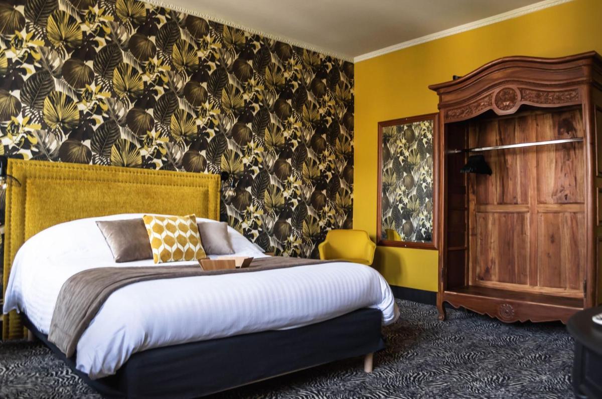 Un ou plusieurs lits dans un hébergement de l'établissement La villa 10 HÔTEL SPA