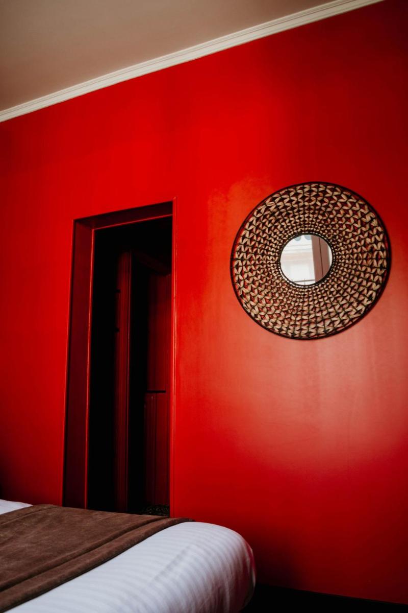 Un ou plusieurs lits dans un hébergement de l'établissement La villa 10 HÔTEL SPA