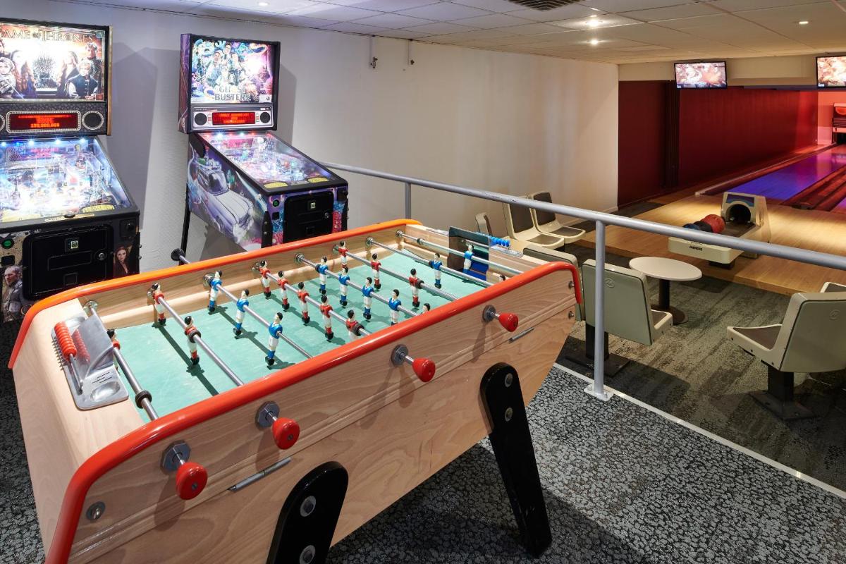 Salle de jeux dans l'établissement Club Vacances Bleues Les Jardins De l'Atlantique