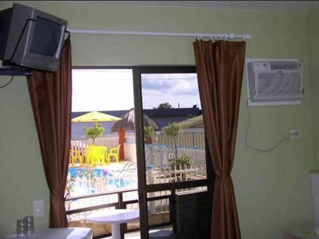 Hotel Pousada Mineirinho - Housity