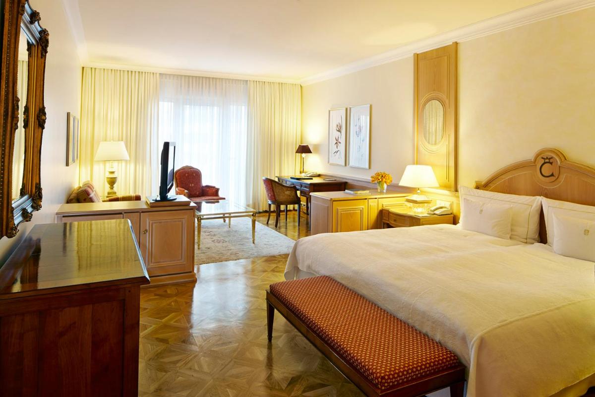 Ein Bett oder Betten in einem Zimmer der Unterkunft Colombi Hotel