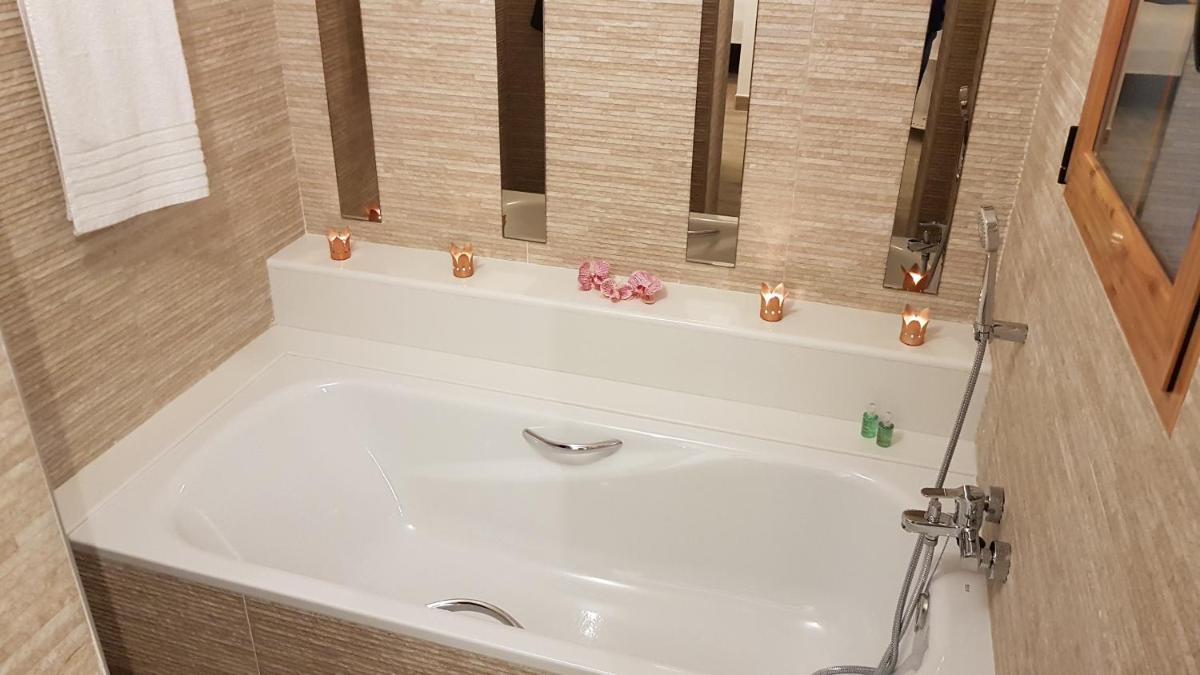 Un baño de Artmonia