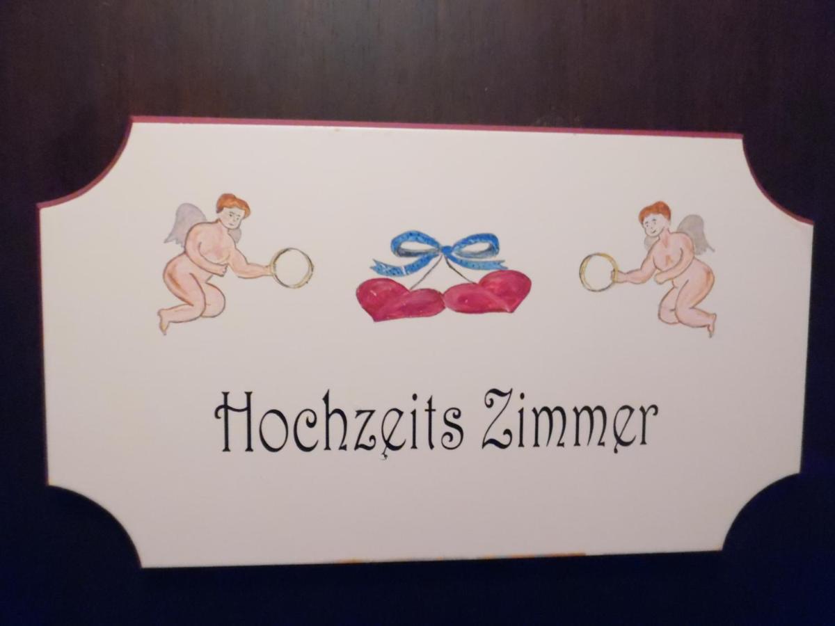 Ein Zertifikat, Auszeichnung, Logo oder anderes Dokument, das in der Unterkunft Wellness und Romantik Hotel Helmboldt ausgestellt ist