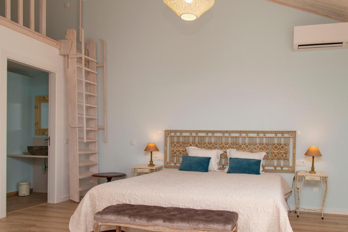 Uma cama ou camas num quarto em Aires da Serra Hotel