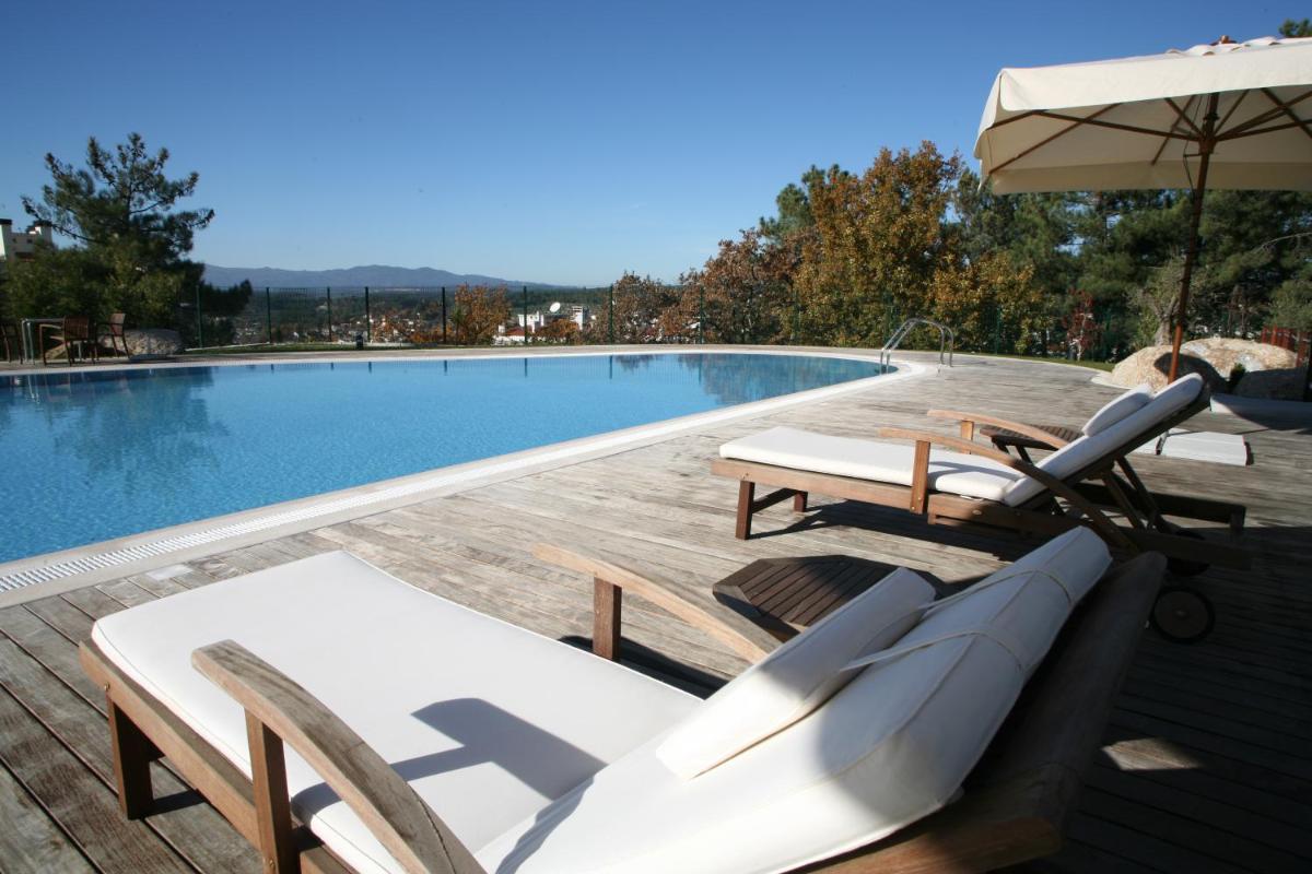 A piscina em ou perto de Montebelo Viseu Congress Hotel & Spa